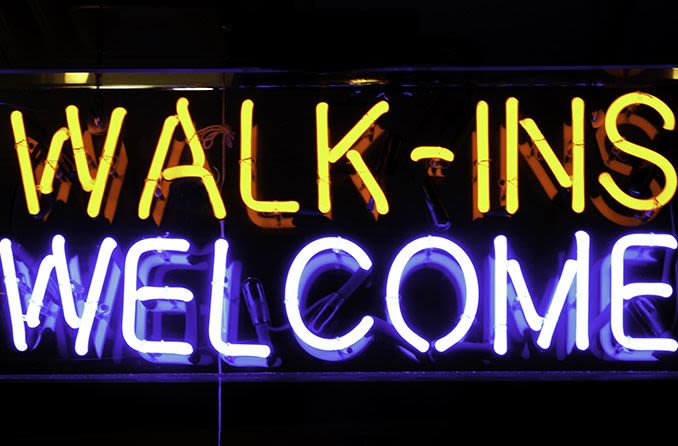 walk-ins welcome neon sign