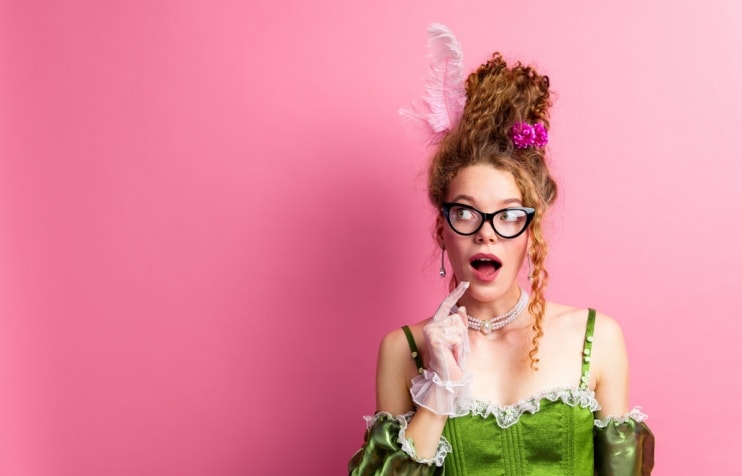 Woman in costume wearing glasses Woman in costume wearing glasses