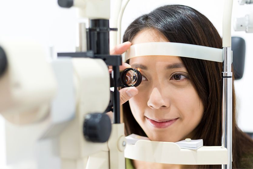 Woman receiving an eye exam
