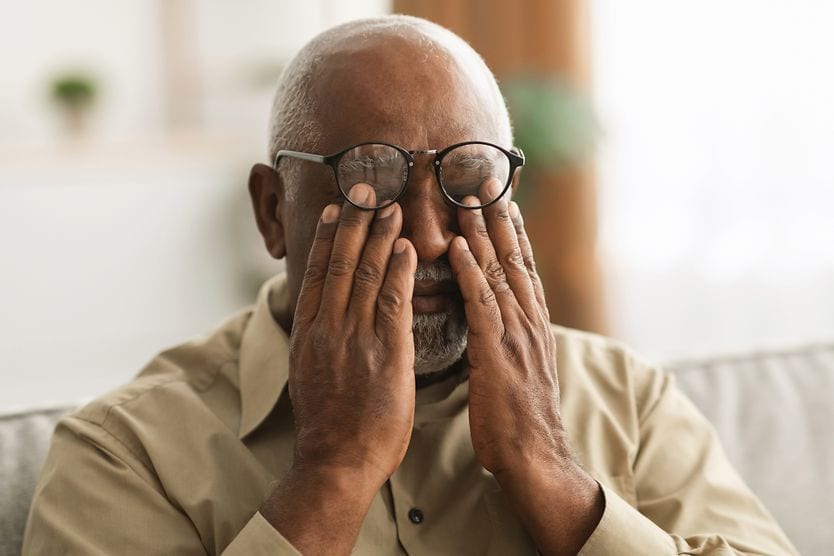 Glaucoma and what it means to be a glaucoma suspect Older man who is a glaucoma suspect rubbing his eyes