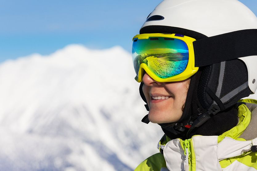 person in ski goggles and helmet