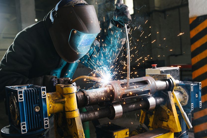 Welder’s flash: Symptoms, causes, treatment and how you can protect your eyes Welder wearing face and eye protection