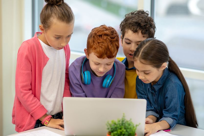 Children looking at a laptop screen