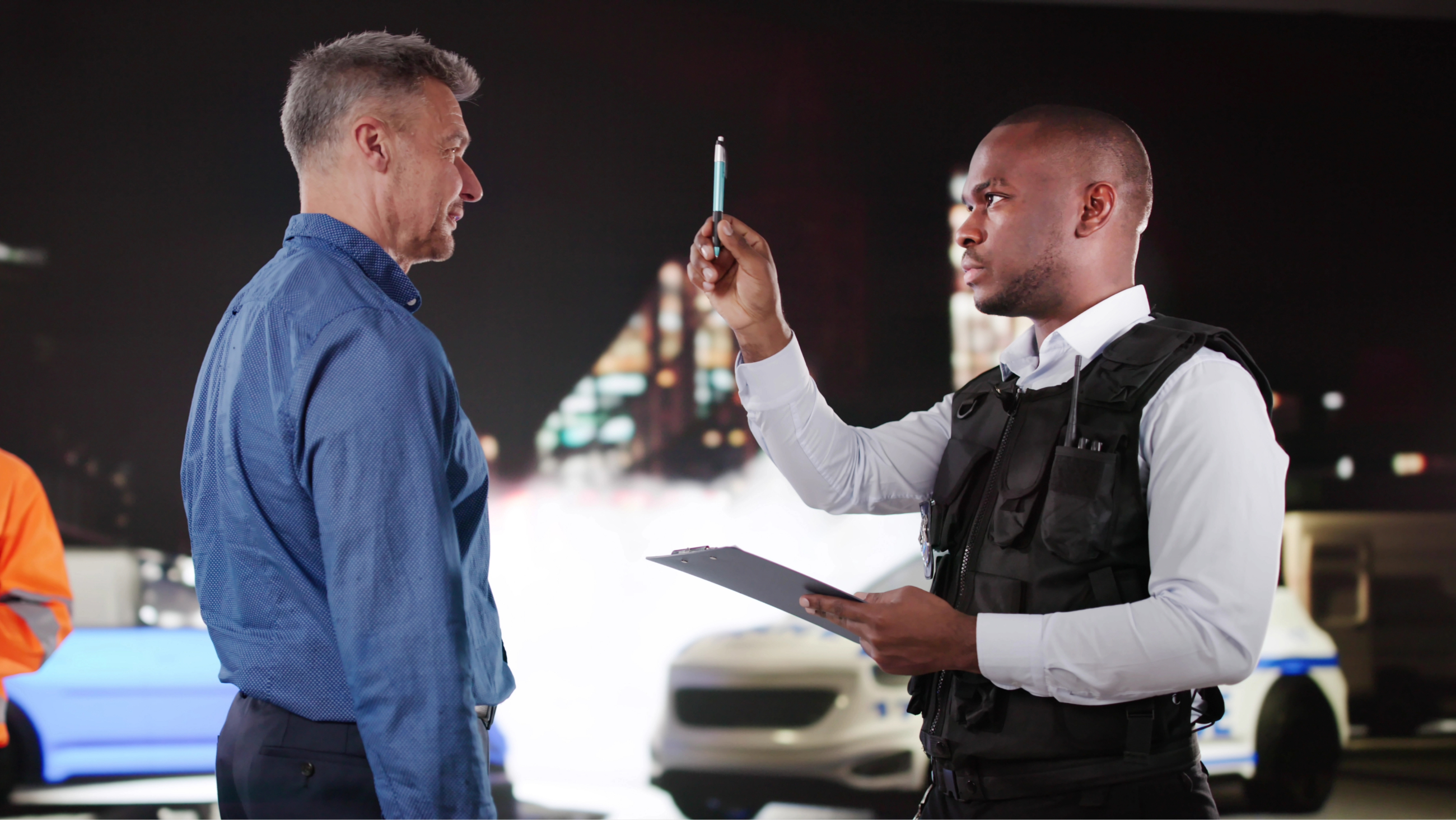 Police officer conducting a field sobriety test