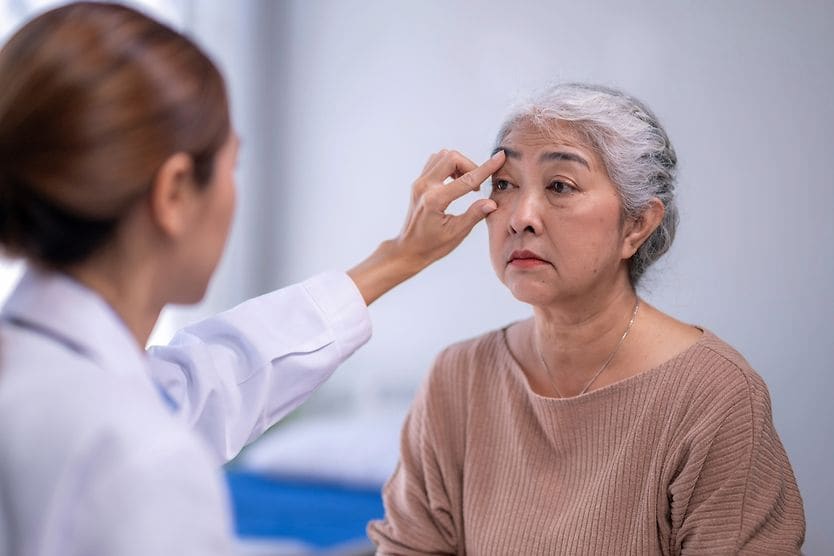 woman receiving a visual field test for ptosis