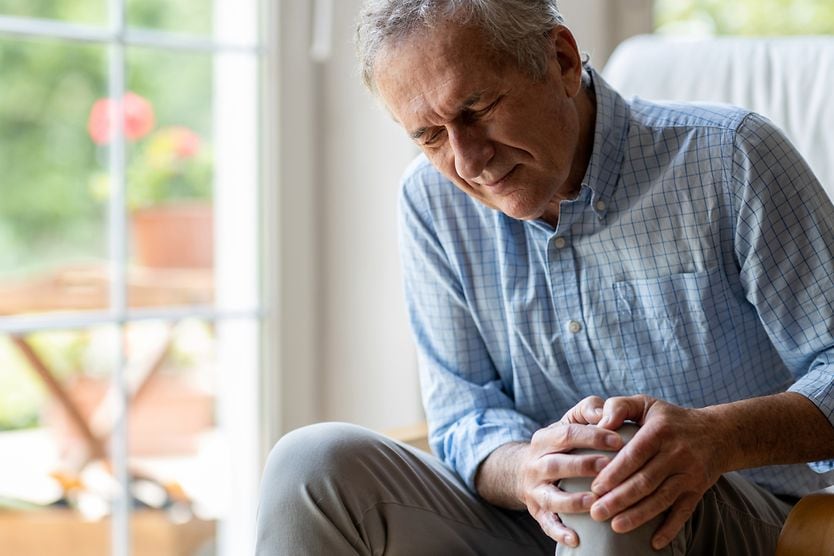 The effect rheumatoid arthritis has on your eyes older man with rheumatoid arthritis squinting in pain