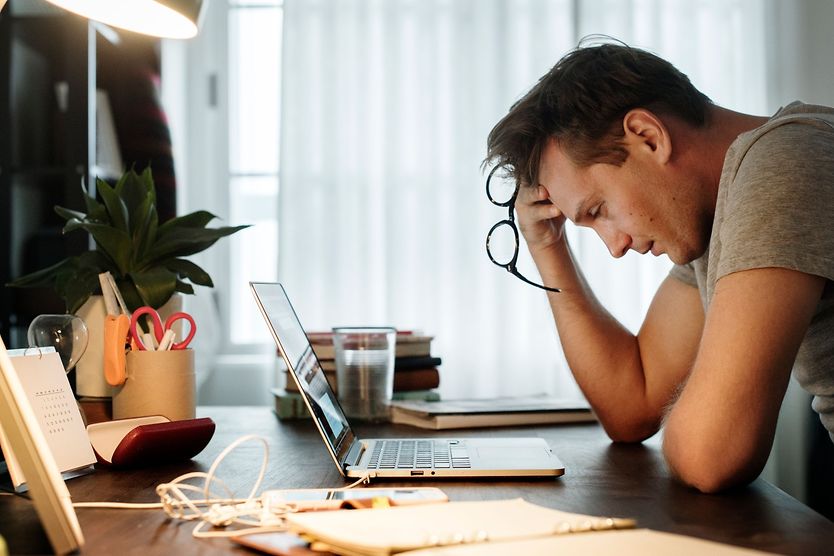 stressed man with vision problems