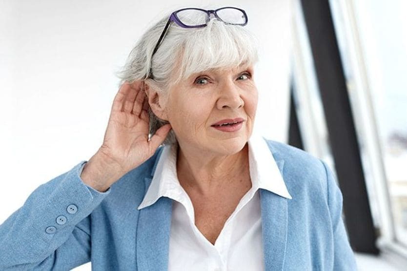 Mature woman having a hard time hearing