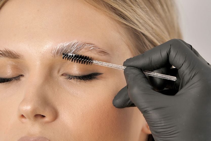 Is brow lamination safe? woman getting brow lamination procedure