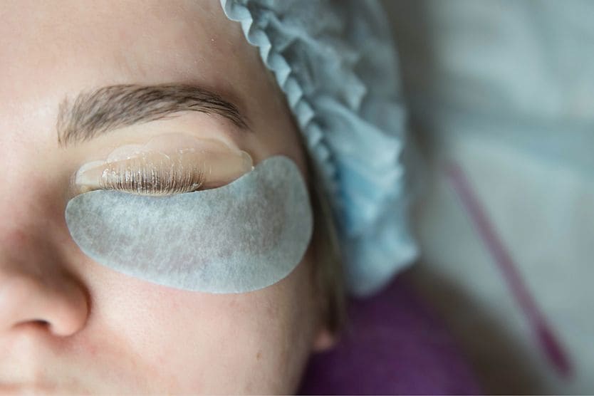 Eyelash lifts: Process, benefits and risks woman undergoing an eyelash lift procedure