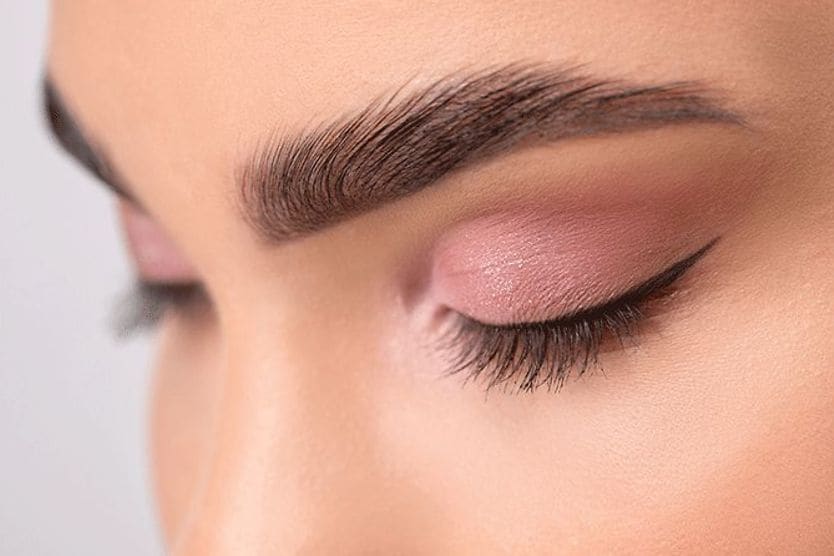 Microblading: Pros, cons and what to expect closeup of a woman's microblading eyebrows