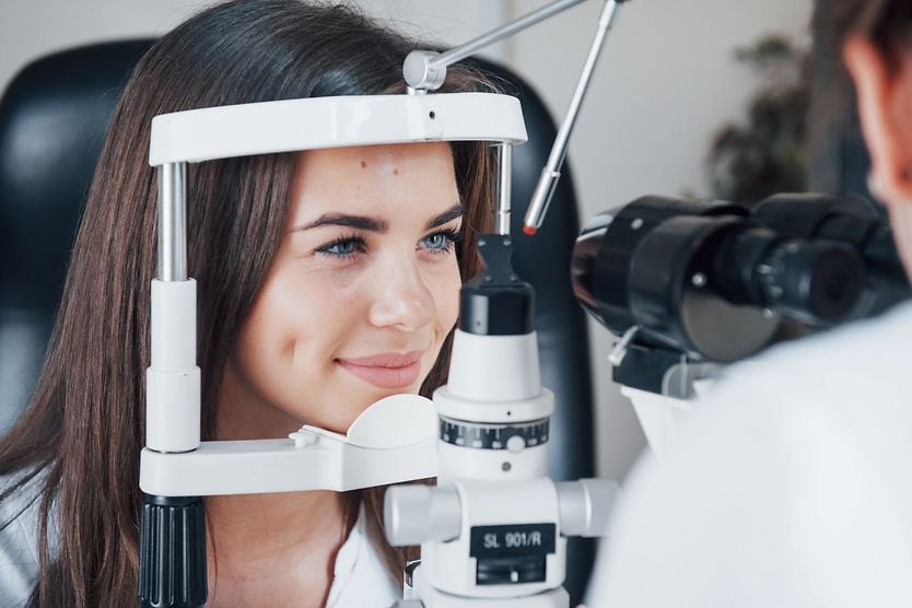 How often should you get your eyes checked? Woman having a glaucoma test eye exam