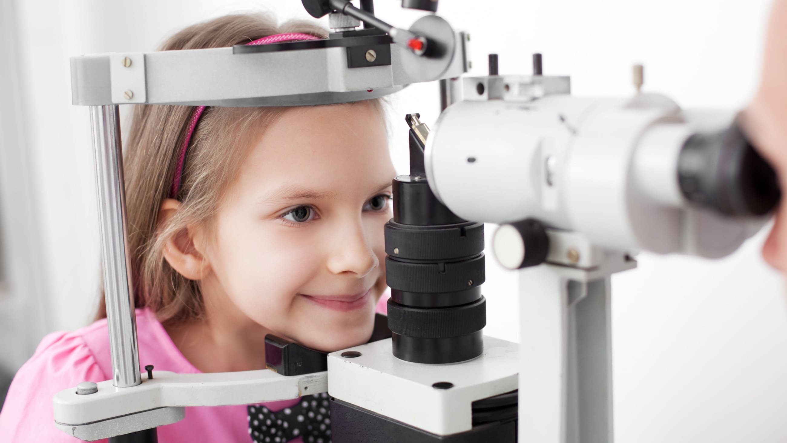 girl having a free eye exam