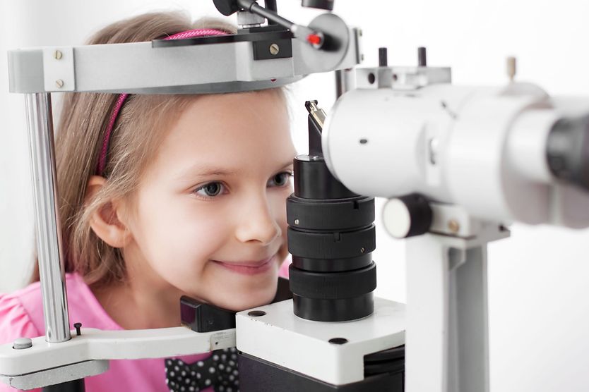 Where to get a free eye exam and glasses girl having a free eye exam