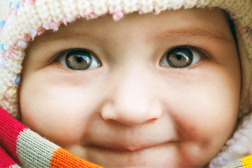 Everything you need to know about your baby’s vision Baby in scarf and hat