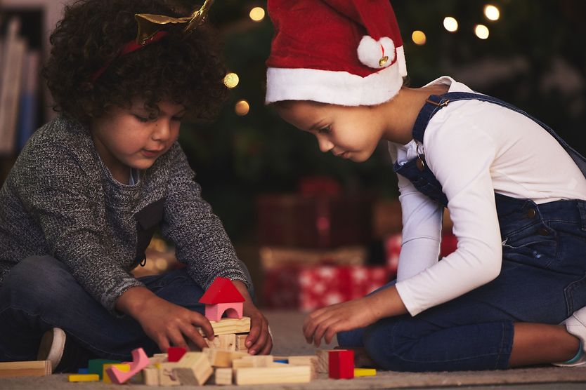 Children playing with wooden blocks