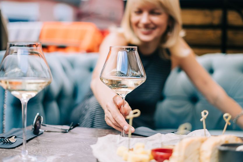 woman with alcohol on a blurry background