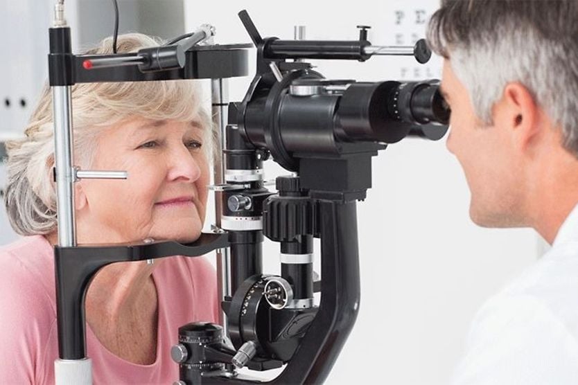 8 ways to protect your eyesight older woman receiving an eye exam