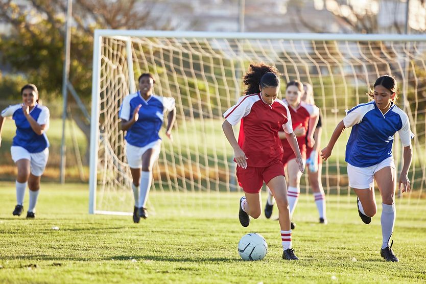 Sports vision tests and training Children playing soccer.