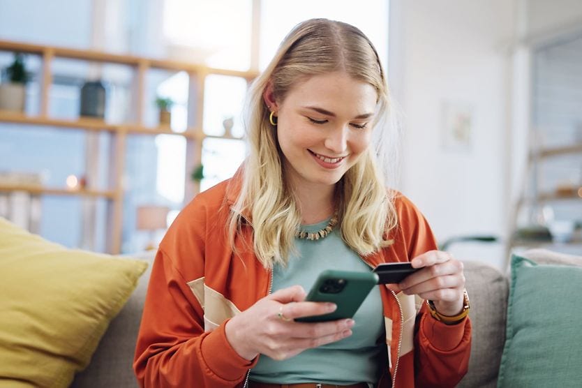 young woman buying contacts online