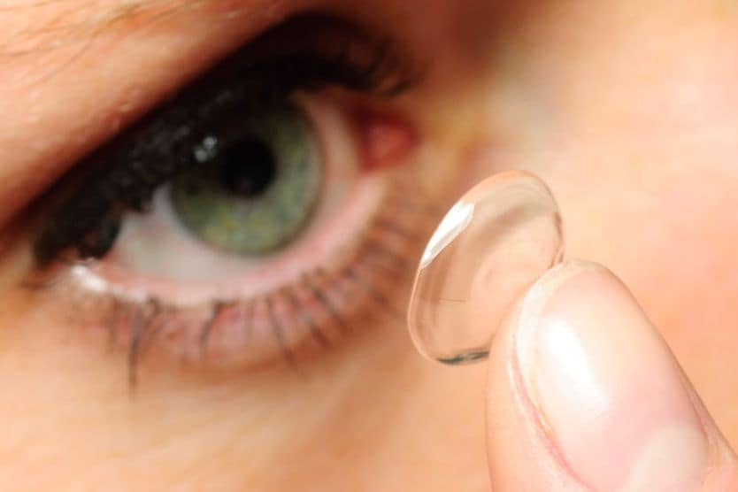 Contact Lenses After LASIK Or Other Refractive Surgery woman inserting contact lense