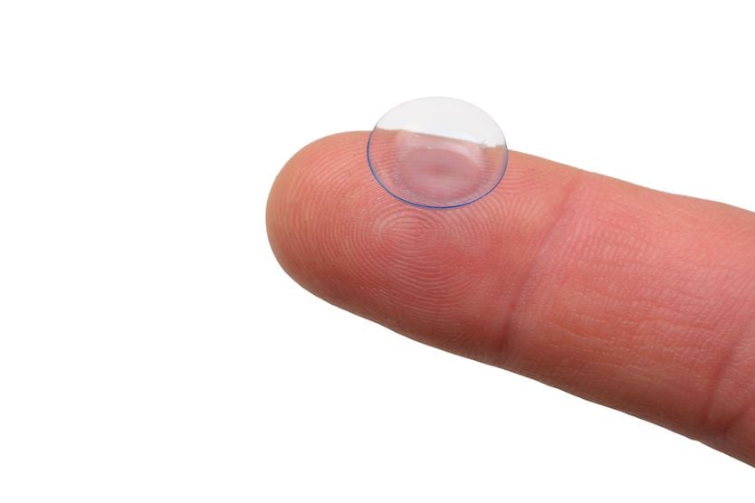 Contact lenses for astigmatism illustration of a the shape of a toric lens and a regular spherical contact lens