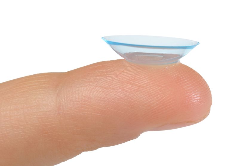 An image of an inside out contact lens, with the edges flipped out, balanced on a fingertip. An image of an inside out contact lens, with the edges flipped out, balanced on a fingertip.