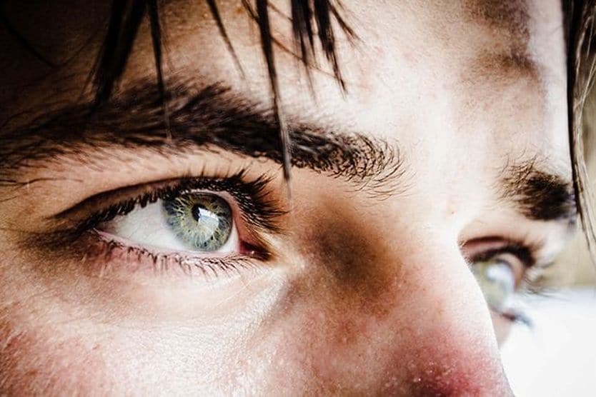 Custom Contact Lenses closeup of man with green eyes
