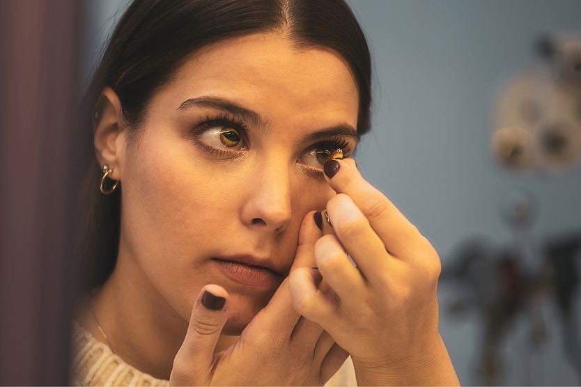 woman wearing halloween contacts