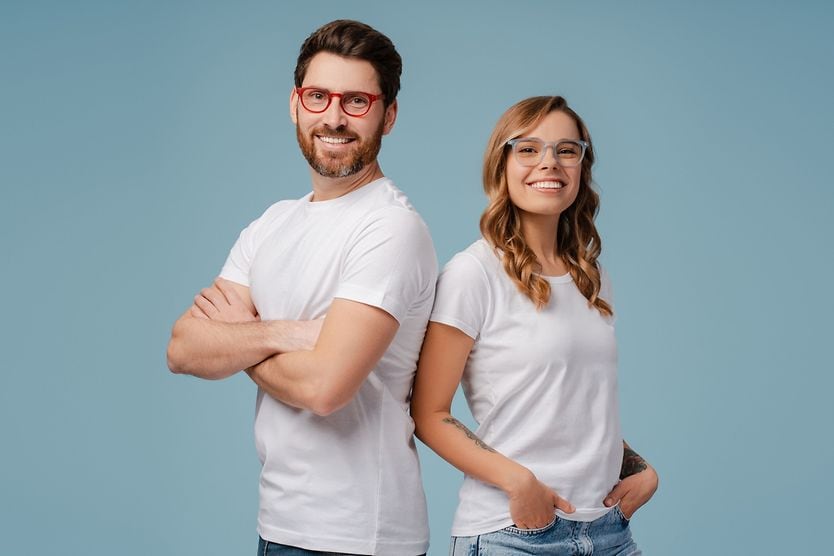 man and a woman wearing eyeglasses