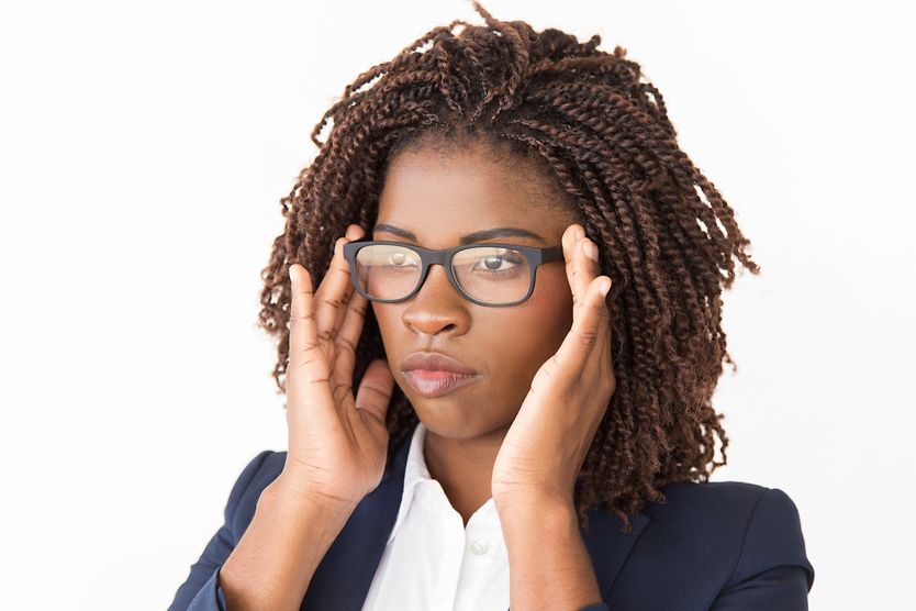 How to adjust your glasses at home woman adjusting her eyeglasses at home