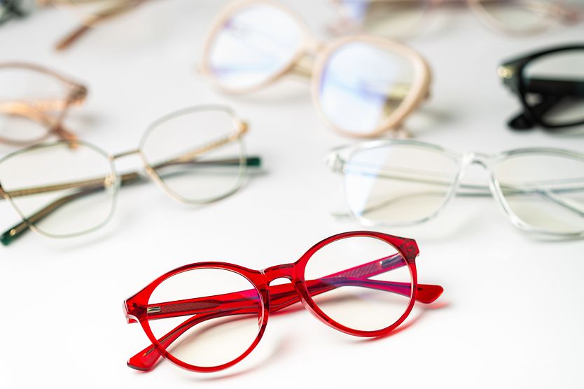 Types and styles of glasses and sunglasses Group of glasses on white background.