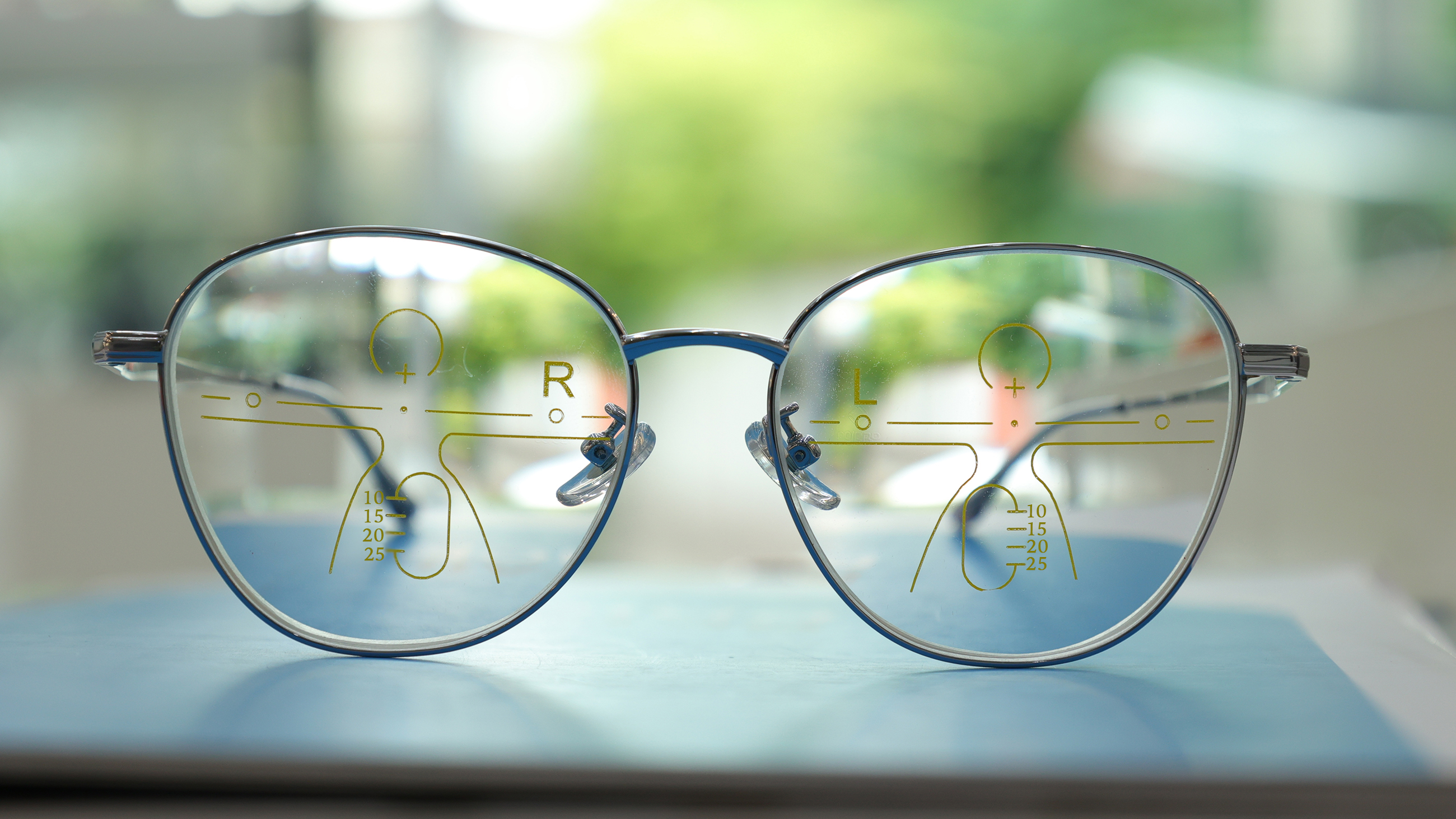 Close-up of glasses with progressive lenses.