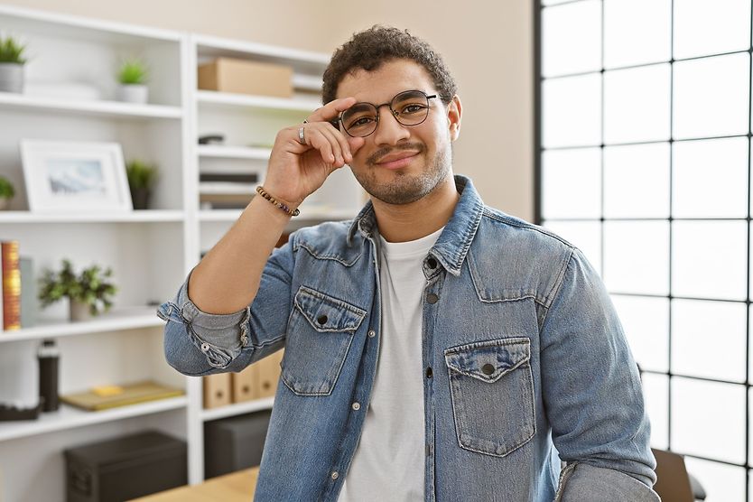 Adjustable Glasses: The Future Of Multifocal Lenses? man adjusting glasses