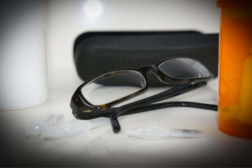 Glaucoma glasses may help manage symptoms Person with glaucoma looking at a pair of glasses