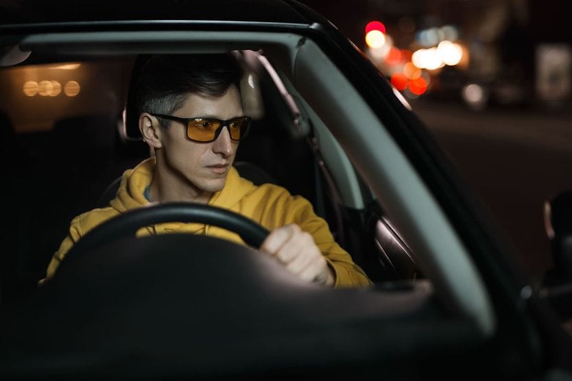Night driving glasses: Help or hoax? Man wearing night driving glasses while driving