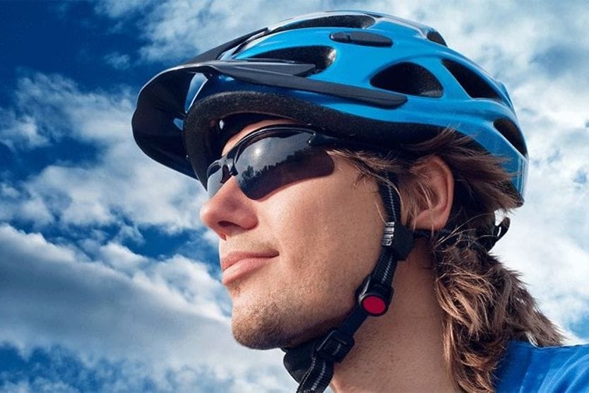Eyeglasses that enhance sports performance cyclist wearing sports sunglasses