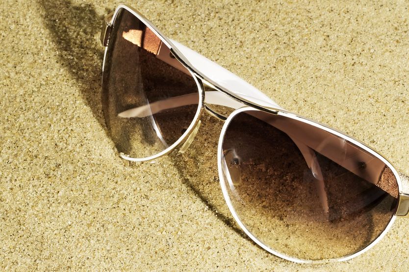gradient sunglasses on the beach