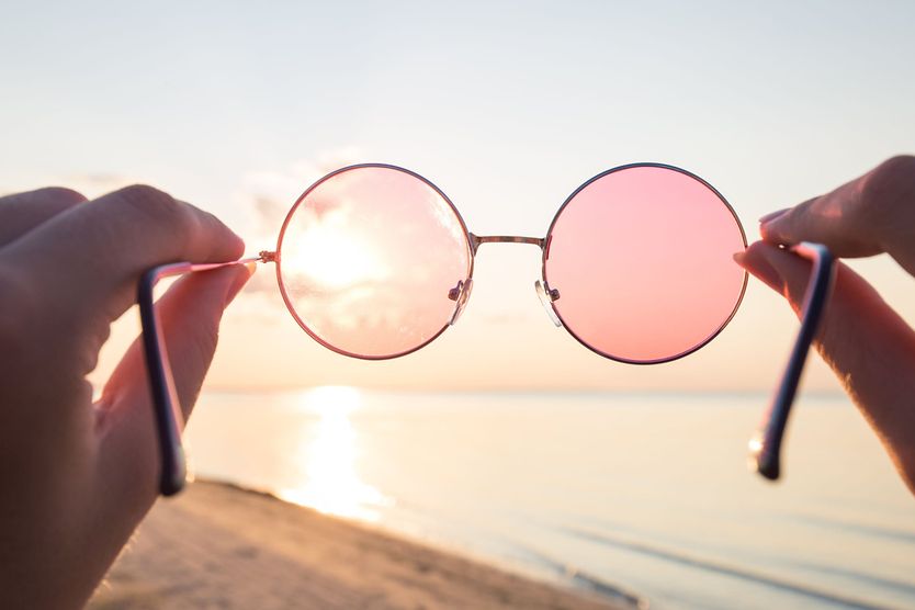 looking at an ocean view through a rose colored glasses