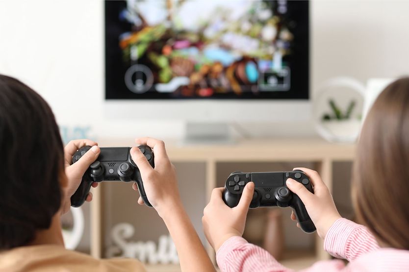 kids playing video games staring at the screen