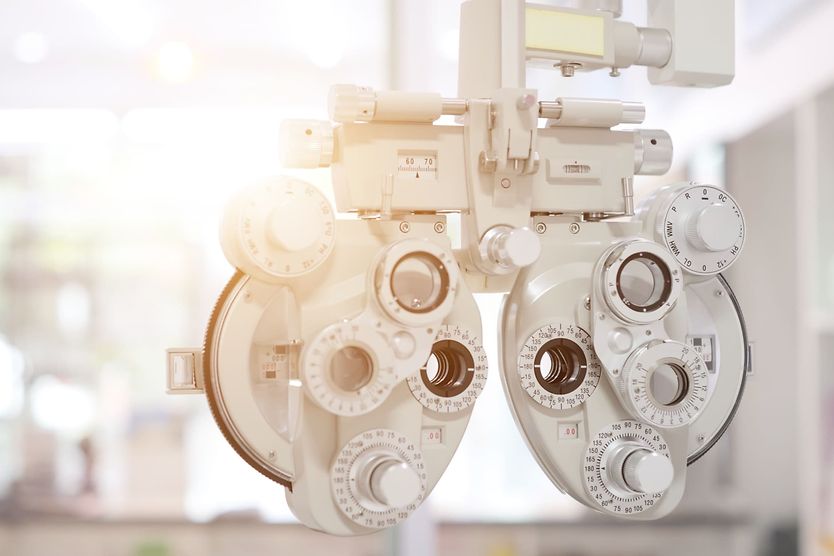 Important dates for eye health and vision awareness A large group of people in the shape of the eye.