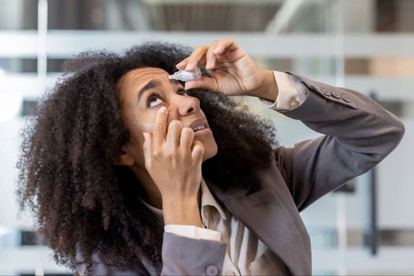 Best eye drops for dry eyes woman putting eye drops into his dry eyes