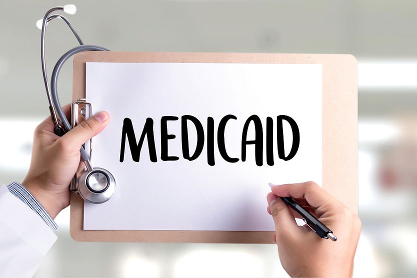 Medicaid written on a clipboard