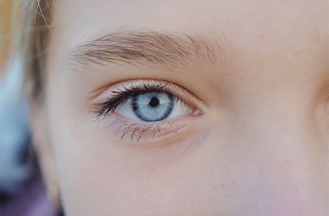 closeup of young child's small pupils