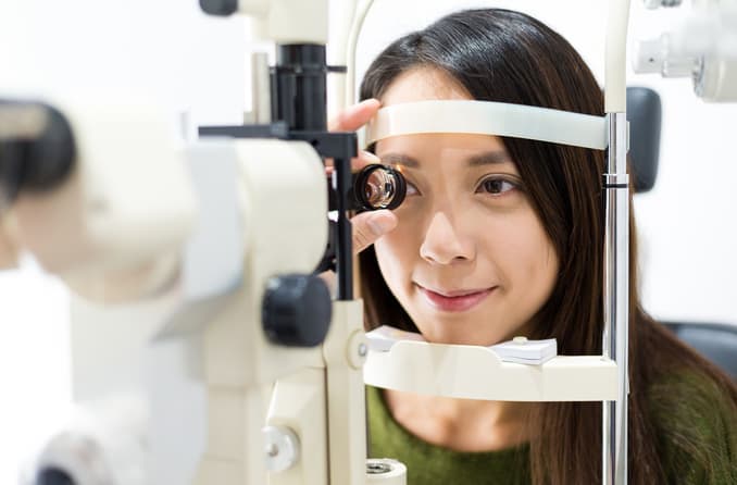 Woman receiving an eye exam