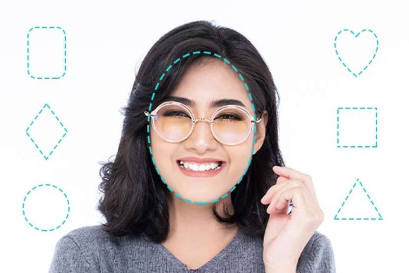người phụ nữ có khuôn mặt hình bầu dục đeo kính