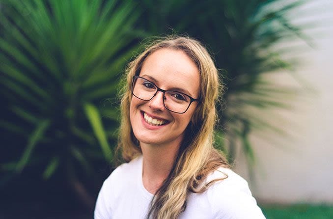 Woman wearing rectangular shaped eyeglasses