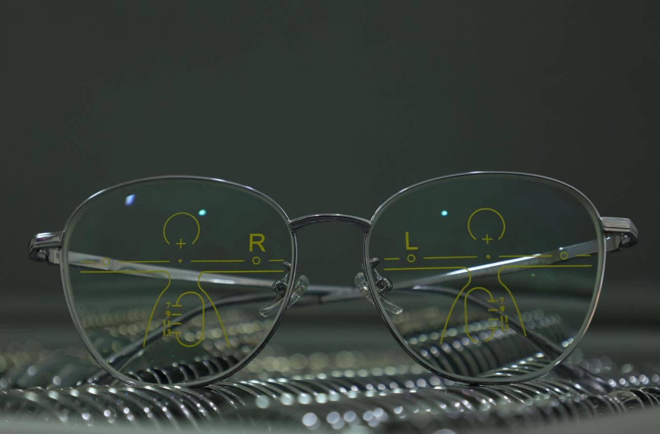 Close-up of glasses with progressive lenses.