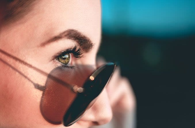 woman wearing aviator sunglasses