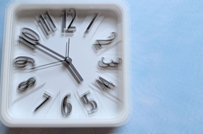 view of a clock with diplopia (double vision)